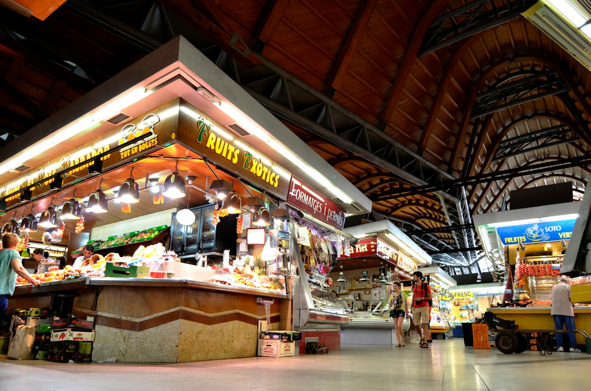 Explore the lively atmosphere of Mercat de Santa Caterina, a bustling market in Barcelona, Spain.